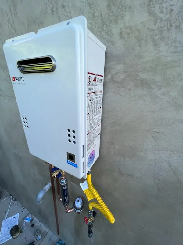 Tankless water heater installation for Fitzell homes